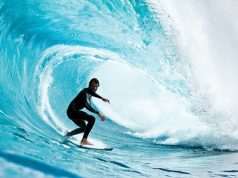 Riding the Waves: A Guide to Surfing Camps for the Experienced Wave Surfer Surfing Camps for the Experienced Wave Surfer